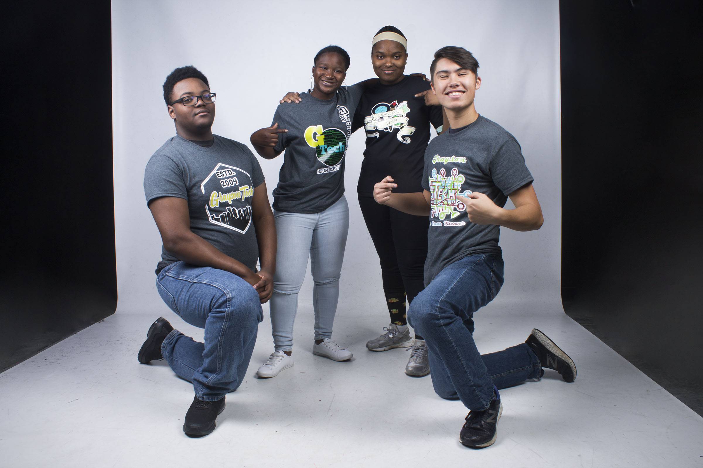 Graphic Design students wearing the t-shirts they designed and produced in class Graphic Design students wearing the t-shirts they designed and produced in class